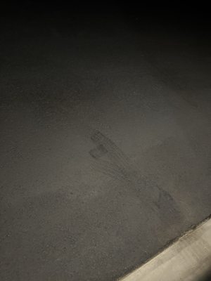 Marks are being left and embedded in the driveway every tire that goes over it.