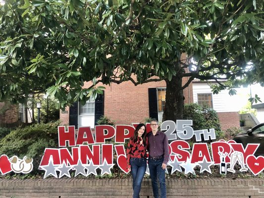 The happy couple with their sign!