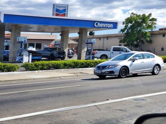 Gas pumpd at Chevron.