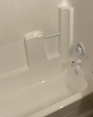 Here is the same tub after our treatment process, and before we untaped the faucets.  This is done in less than a day.