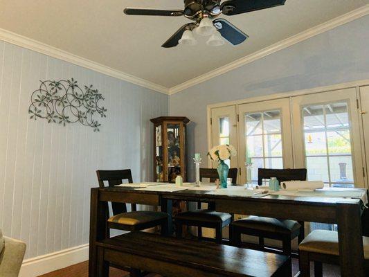 SWP painted our dining space, crown molding, and baseboards using Dunn Edwards paint.