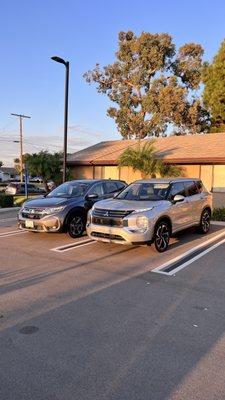 Our Honda CRV getting picked up and Mitsubishi Outlander getting dropped off