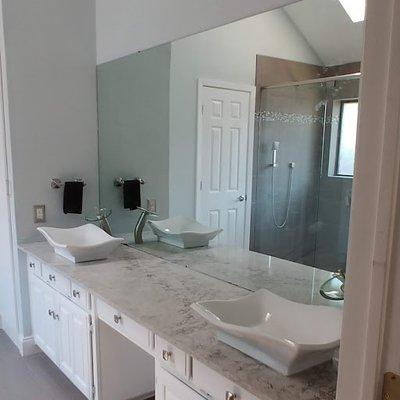 vessel sinks and quartz countertop