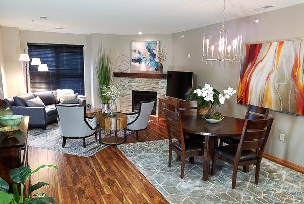 Transitional living room with stacked stone fireplace