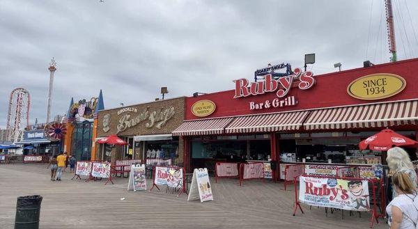 on the Boardwalk next to Ruby's and Luna Park entrance