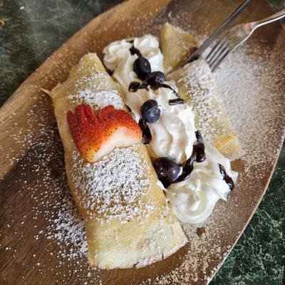 Strawberry and chocolate moose crepes on the left and lemon blueberry ricotta on the right YUM!