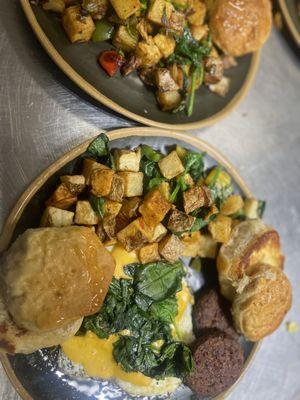 Veggie patties biscuits, fried egg with cheese, home fries with spinach