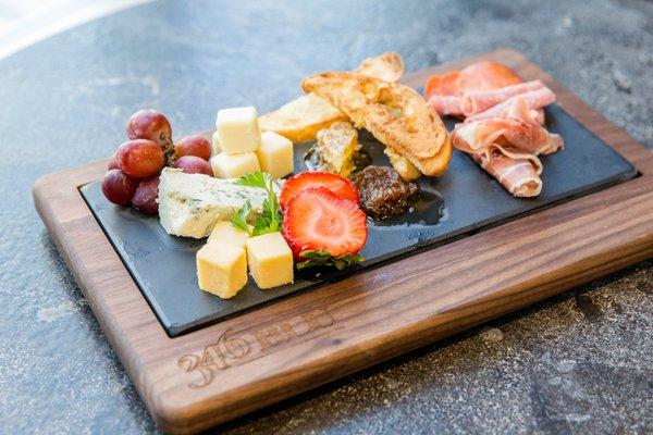 Parisian Picnic Cheese & Charcuterie Board Chef's selection of three cheeses, selection of cured meats, honey comb, fig jam and fruit