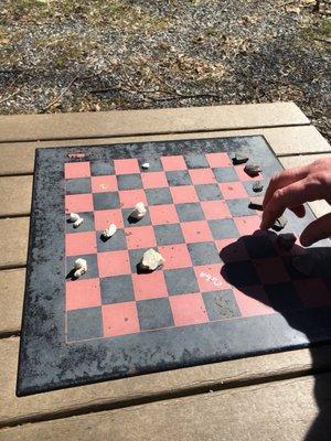 Use rocks for checkers