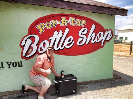 Posing for a picture in front of THE Great Wall of Pop A Top