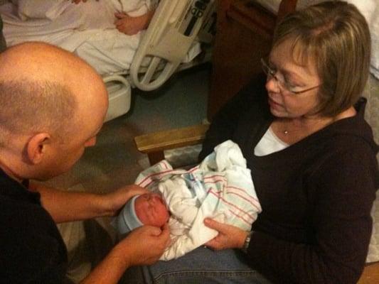 Sandusky chiropractor Dr. Steve Prentice adjusting a newborn