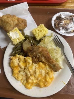 Chicken plate with 3 sides, cornbread, dessert and drink.