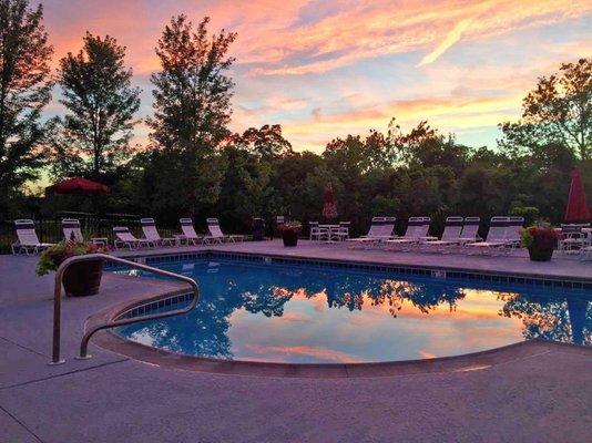 Beautiful sunset over the pool.