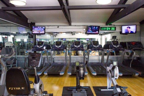 Cardio room: treadmills, stationary bikes, ergs.