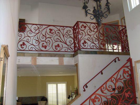 Custom hand forged scroll stair railing