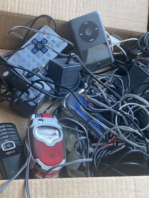 Cords and old phones and electronics. They only take 3/per visit ugh