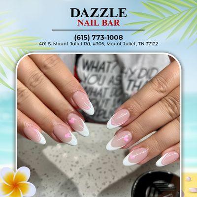 "Welcome May with a fresh manicure at our nail salon! Embrace the season with vibrant colors and floral nail art.