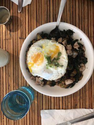 BYOBB made with brown rice, sweet potato & sautéed kale, Thai peanut, chicken, and two fried eggs. Very good, I recommend!