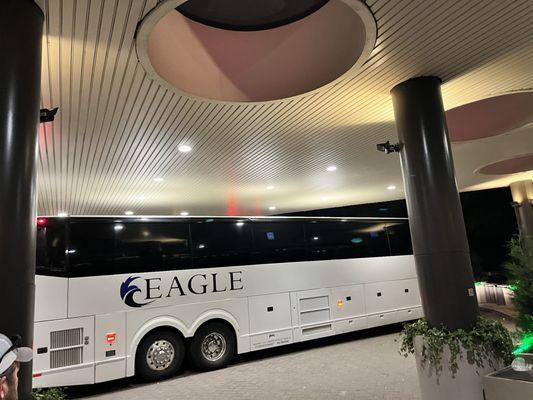 Buses pulling into the hotel after a long day traveling with over 200 kids and chaperones.