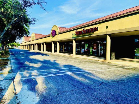 "Shady trees" at Trade Winds Shopping plaza.