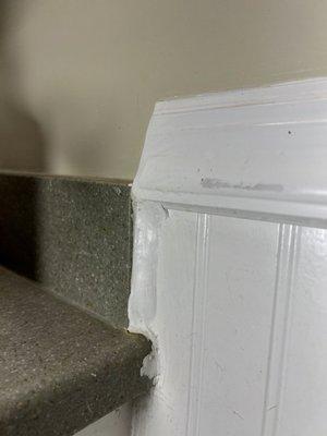 Countertop meets wall and chair rail. Did you notice the missing paint on the rail?