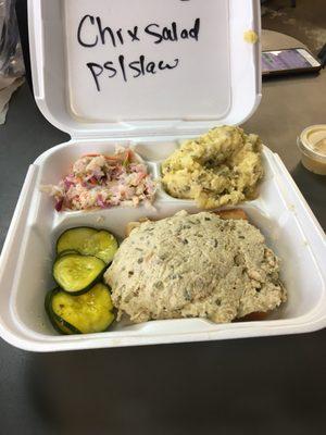 Chicken salad plate, potato salad and slaw