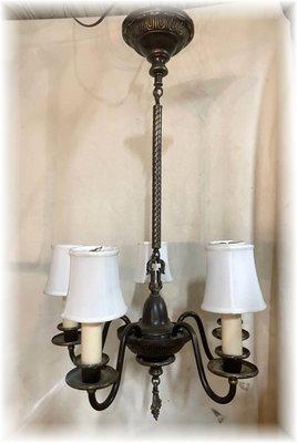 c. 1925 brass candle chandelier shown with silk clip shades