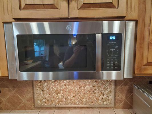 One nice GE profile microwave with gap filler trim kit