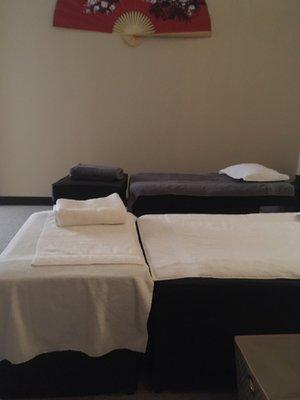 The $29 massage is clothed in group room. Still quiet and relaxing.