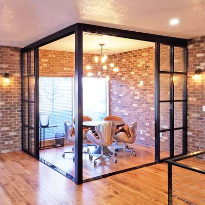 Sliding glass room dividers can maximize the floor plan of your home or office, without requiring permits or the mess of construction.