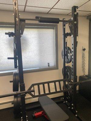 full squat rack, and all specialty bars.