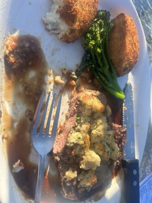 Parmesean crusted steak, mashed potato patties, fried, with broccoli rabe and marsala sauce