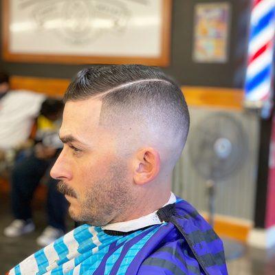 High skin fade gentleman's cut