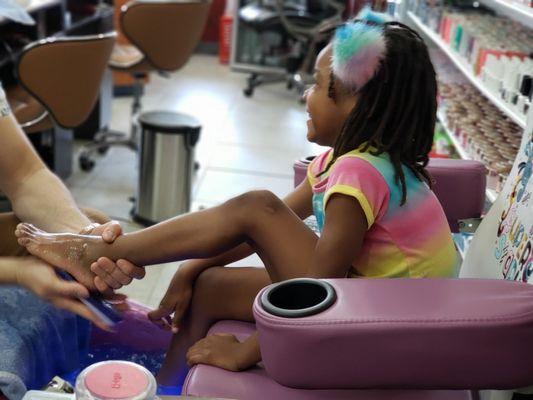 Riley getting her first pedicure by Tony!!!!