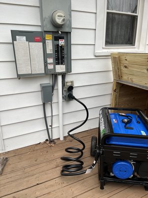 Portable generator hooked up for back up power