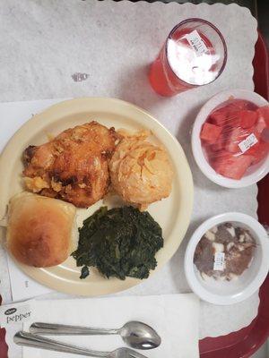 Baked Parmesan Chicken, Scalloped Potatoes,  Garlic Spinach, Hot Bread, Rocky Road Pudding, and Watermelon