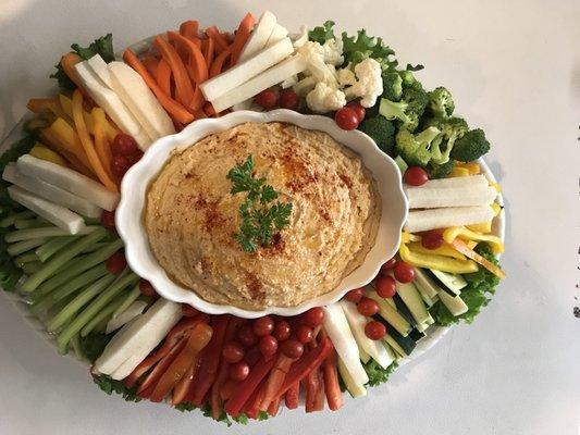 Roasted pepper and garlic hummus with vegetables dip