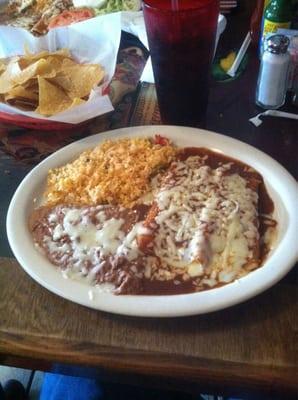 Two cheese enchiladas, rice, beans.