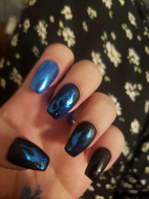 Chrome flames on matte black nails