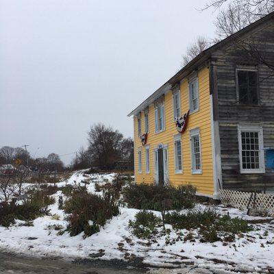 Yellow house at the side of the Street