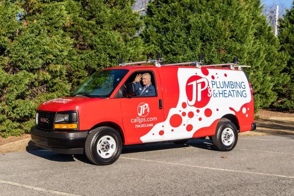 Our brand new, sharp, recognizible plumbing van.