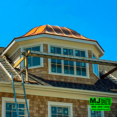 An eye-catching metal roof that steals the show from every angle. Its warm luster and impeccable craftsmanship make this roof a true masterp