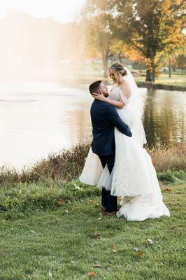 Bride and groom after ceremony at Turf Valley Resort fountain.