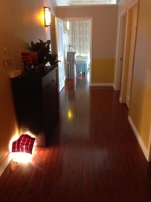 Hallway with wood floors