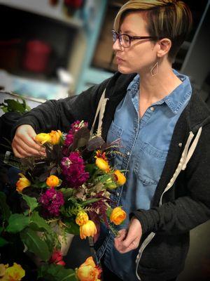 Lauren one of our lead designers is creating a special arrangement for one of our standing customers.