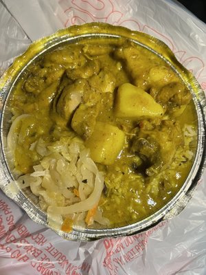 Curry chicken with rice and cabbage