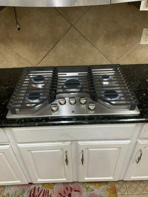 Gas Cooktop not lighting due to a defective spark module. Technician replaced defective part and unit back to normal operation.