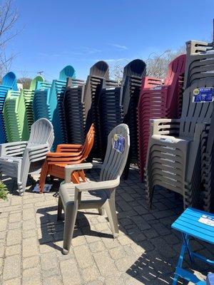 Mountains of lawn/patio furniture in a rainbow of colors