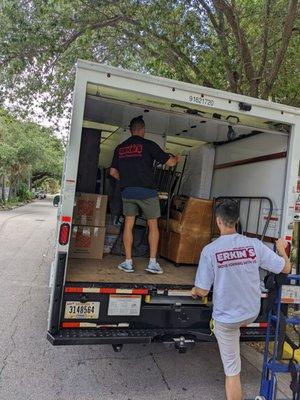 Two very polite movers, hard at work.