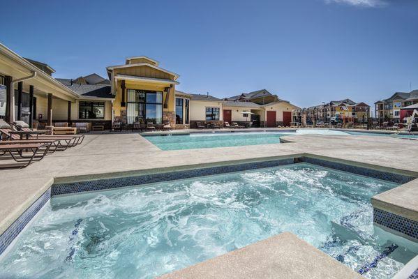 Spa amenity at resort-style pool area,